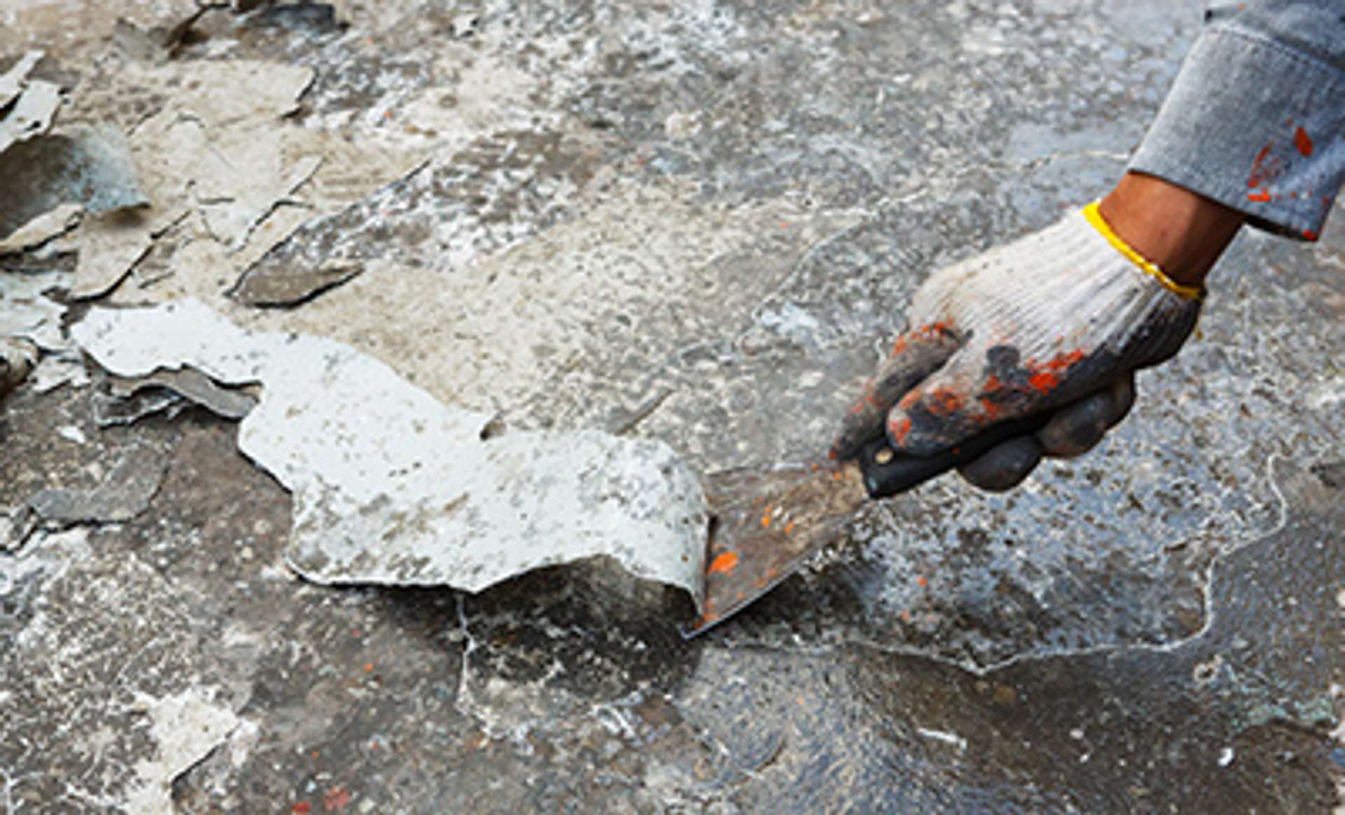 scraping paint off wall